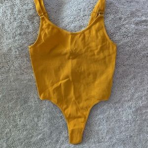 Yellow body suite